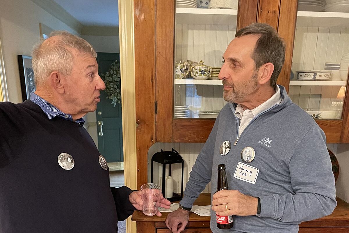 HRA alumni shaking hands class of 1965