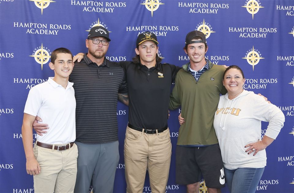 HRA Senior Colby Motley with family on signing day