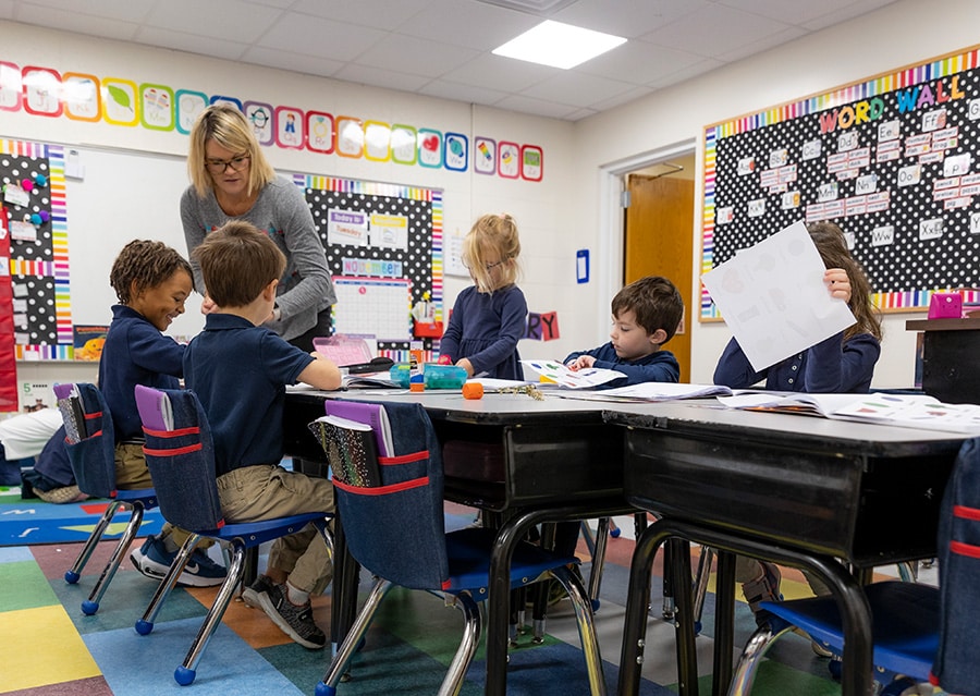 Lower school classroom with students doing work