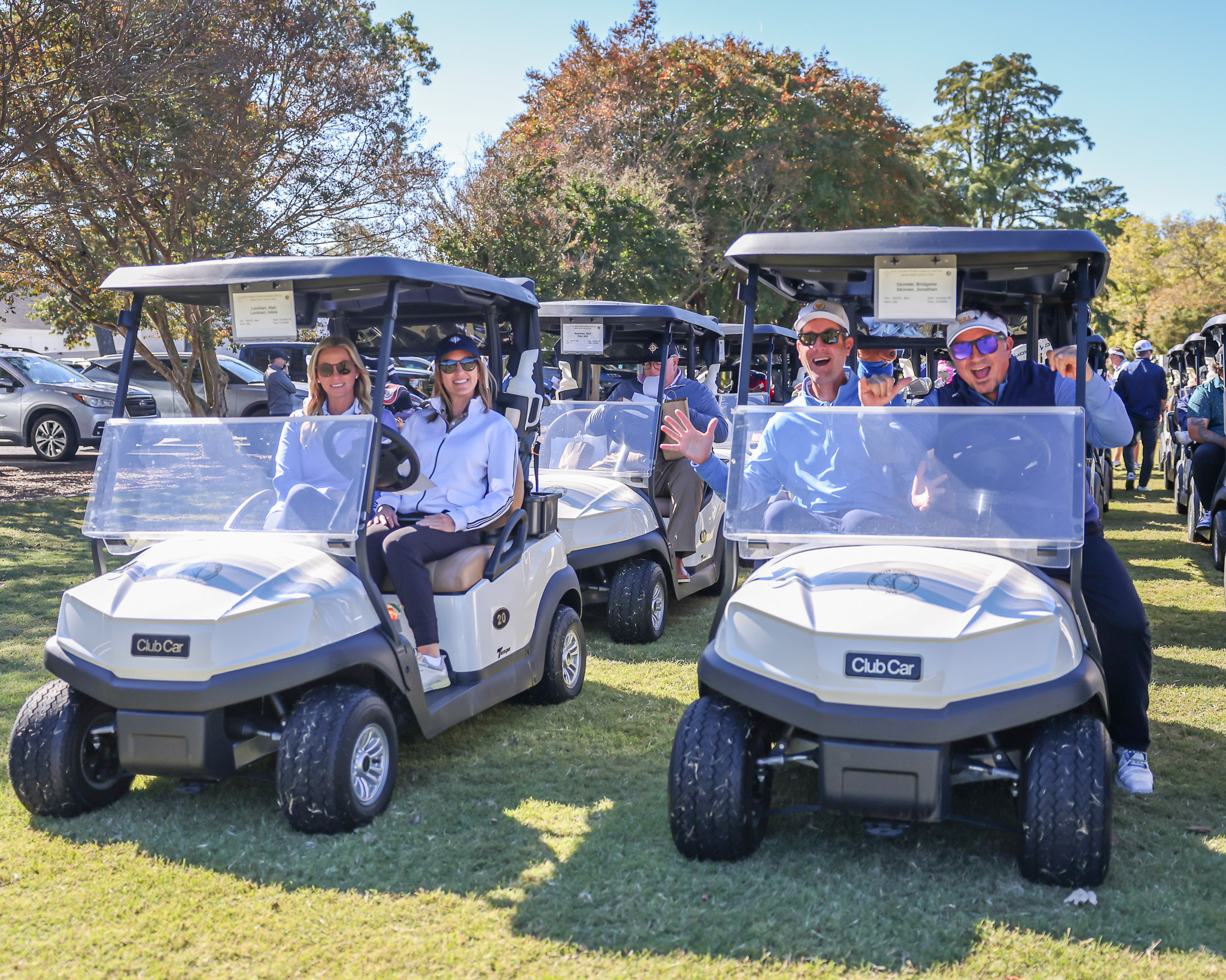 HRA Golf Classic participants in golf carts