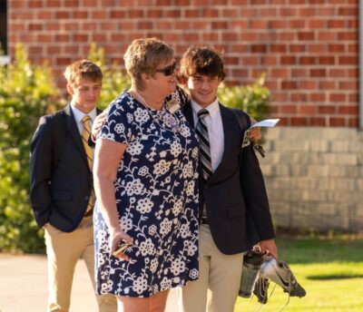 Lisa Thatcher, Director of HRA's Student Support Center, greets students