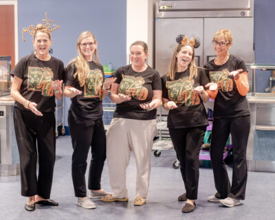 HRA Middle School faculty members in "Haunted by 6-7" T-shirts