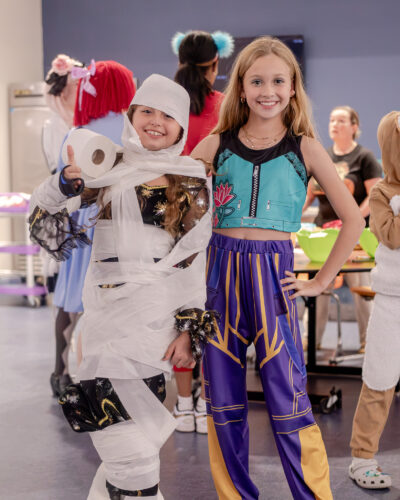 HRA students in mummy-wrapping contest at Halloween Happenings 2025