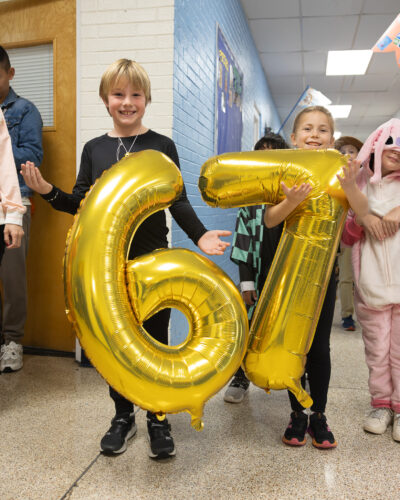 HRA Lower Schoolers in "6-7" costume