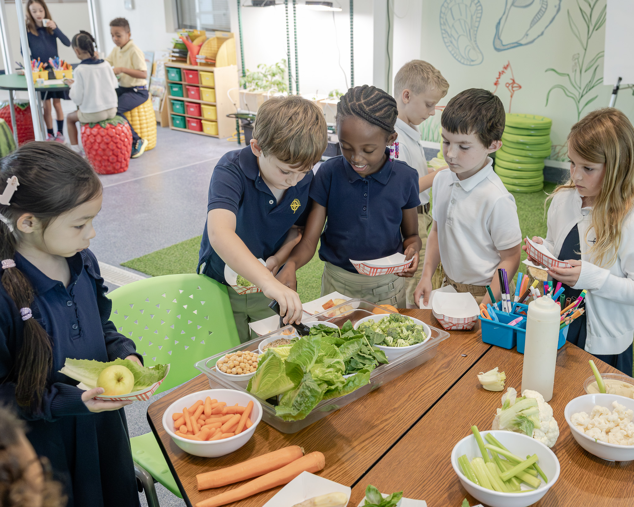 Hydroponics_Grade 2 Class HRA second graders sample produce grown in the Martha H. Patten Hydroponics Lab