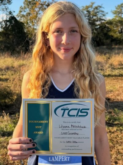HRA cross country star Lily Melnitchouk '28 with MVP award