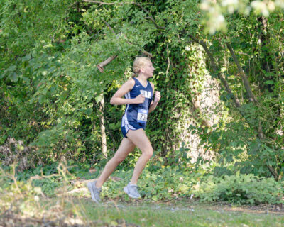Lily Melnitchouk '28 running for HRA girls varsity cross country