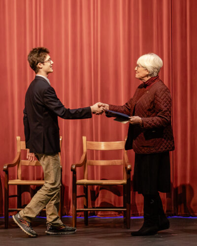 Ares Marvell-Nguyen '26 with Director of Lower School Susanne Swain '78 at HRA's 2026 Cum Laude induction ceremony