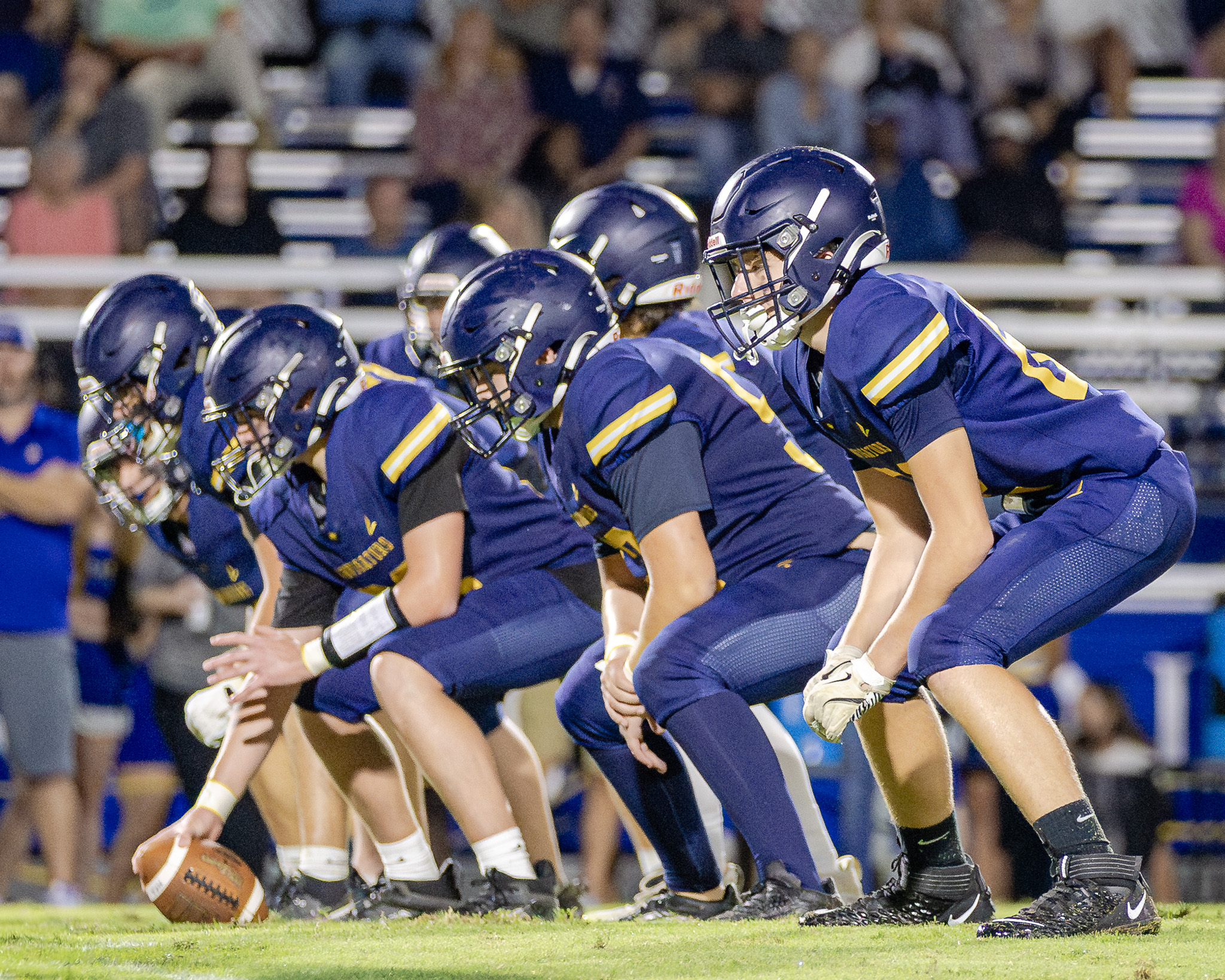 HRA varsity football team at the line of scrimmage in fall 2025