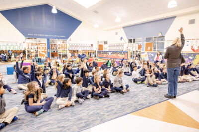 Author Stacy McAnulty presenting in the HRA Lower School Commons