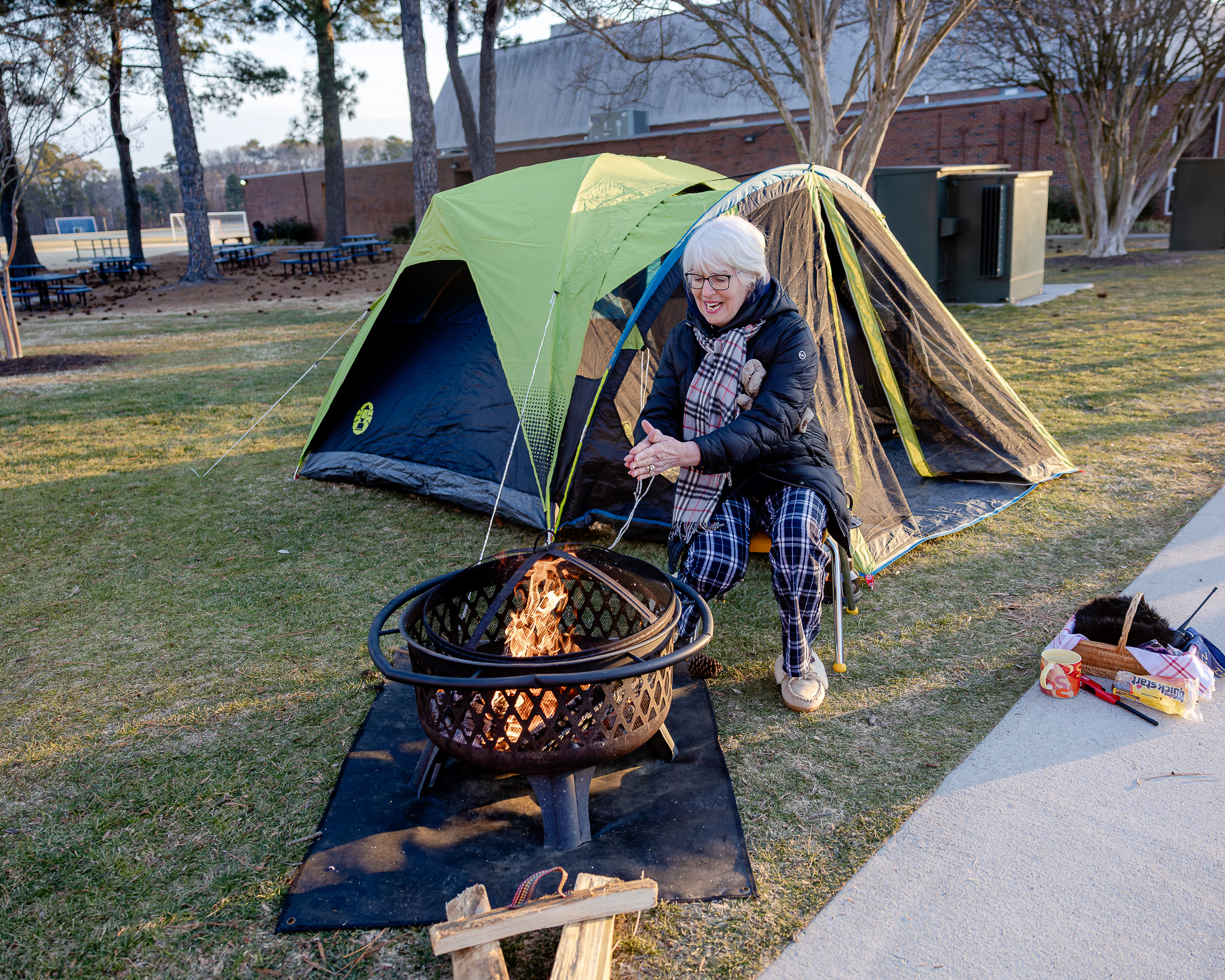 HRA Director of Lower School Susanne Swain '78 at a fire pit