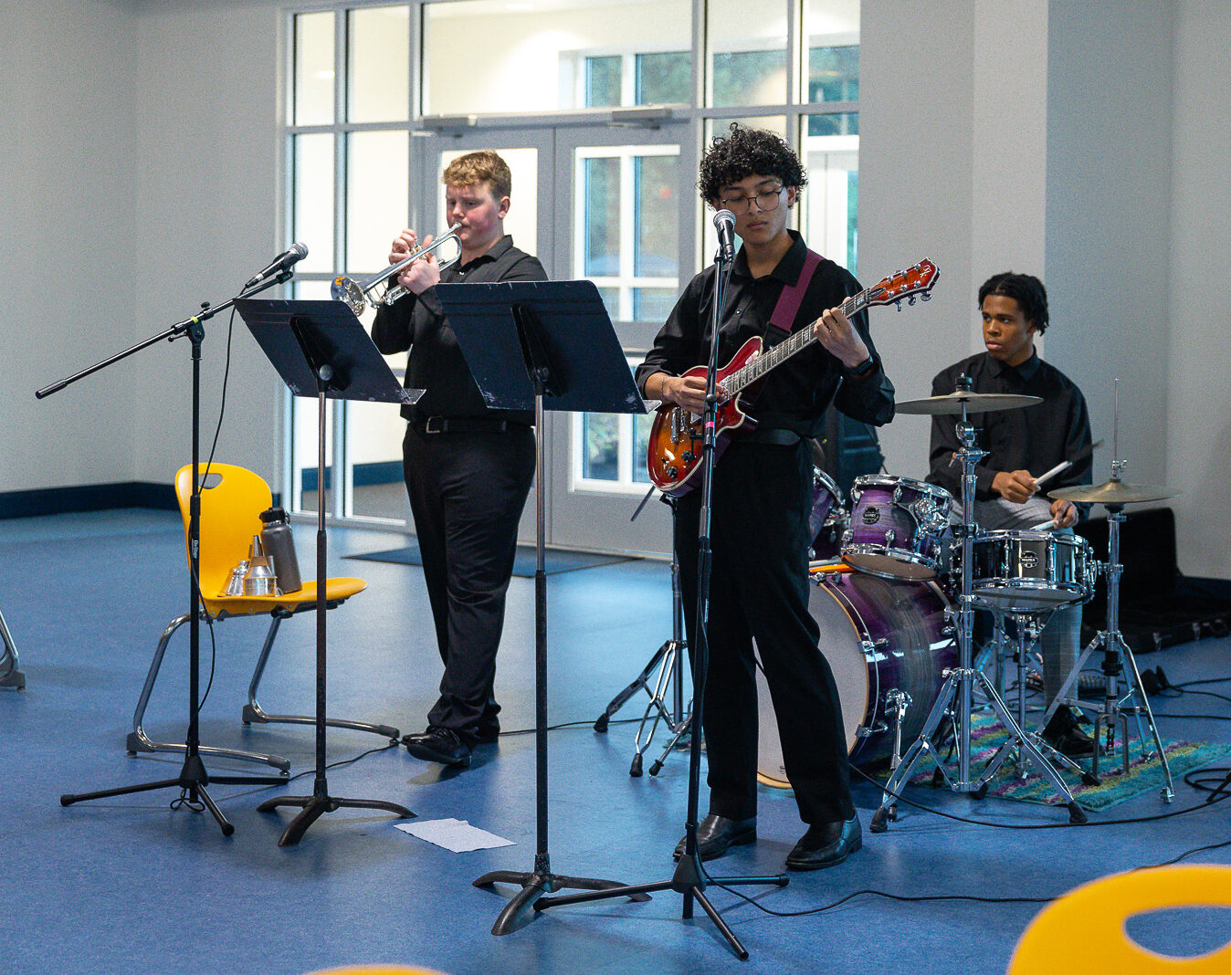 The Compass Combo, a student jazz ensemble, performs at HRA's 2025 on-campus reunion party