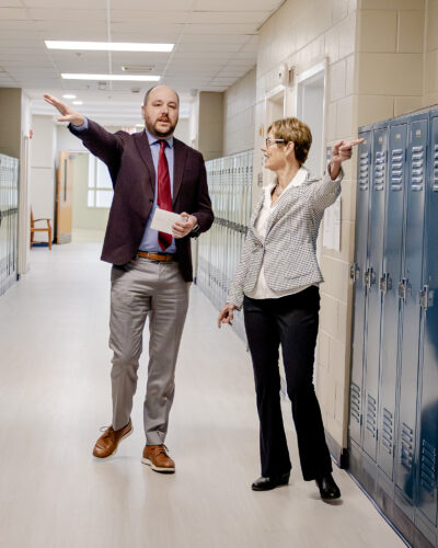 Alumnus David Schmidt '05 tours the halls of HRA with Interim Director of Middle School Karen Gillespie