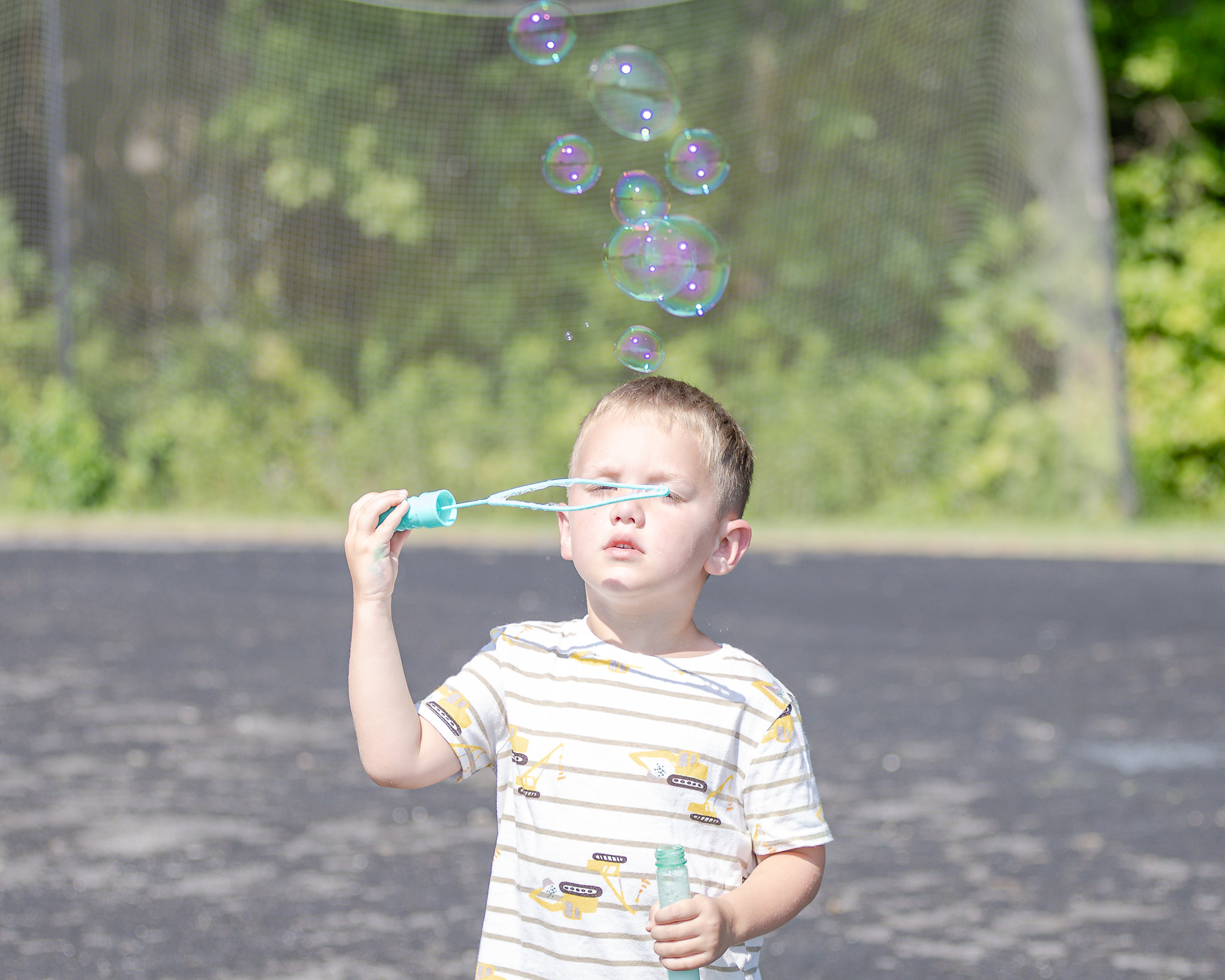HRA camper blowing bubbles