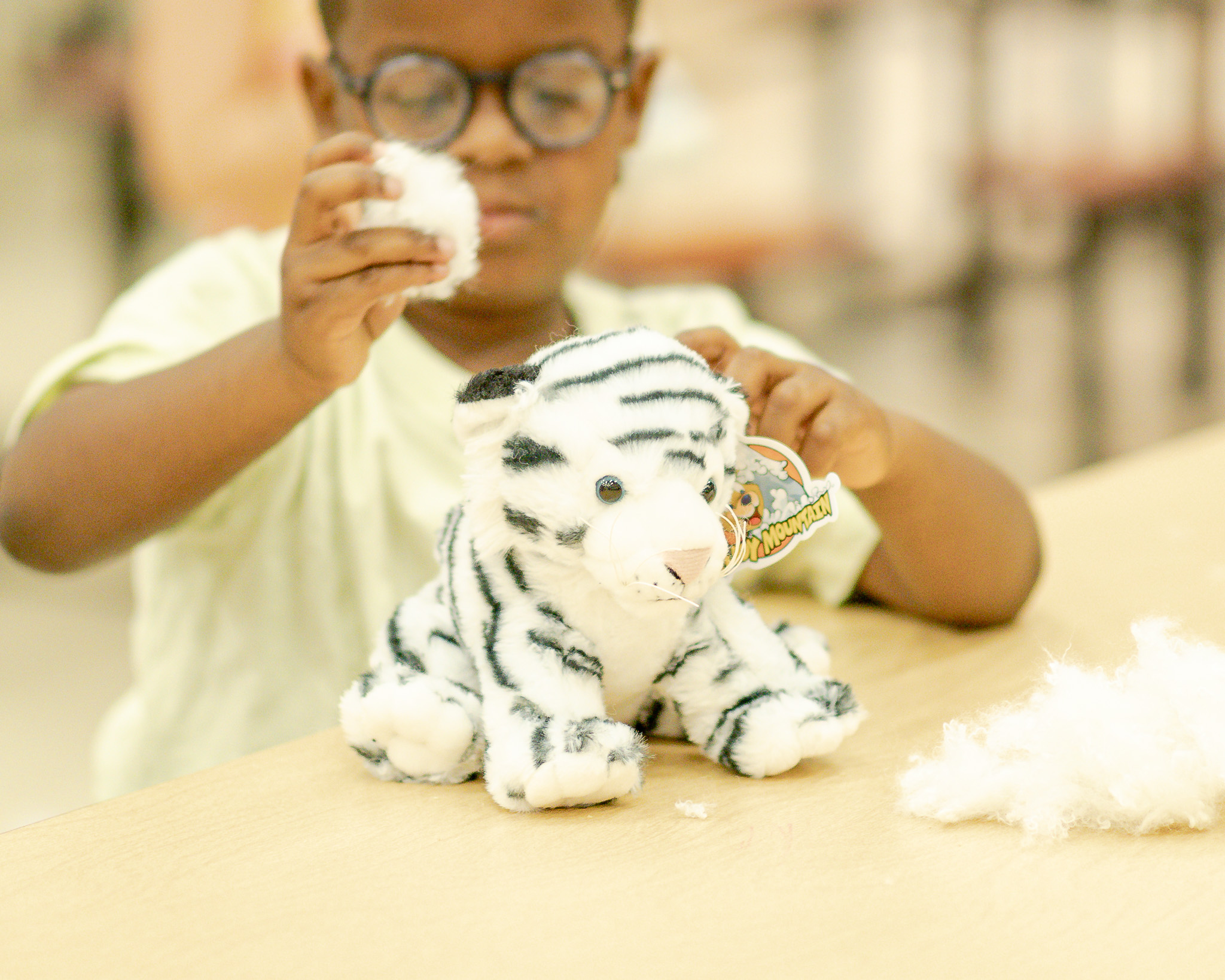 HRA camper creating a stuffed animal