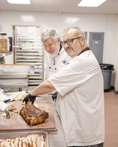 HRA's Executive Chef Uwe Schluszas and Sous Chef Jesse Rowe in the kitchen