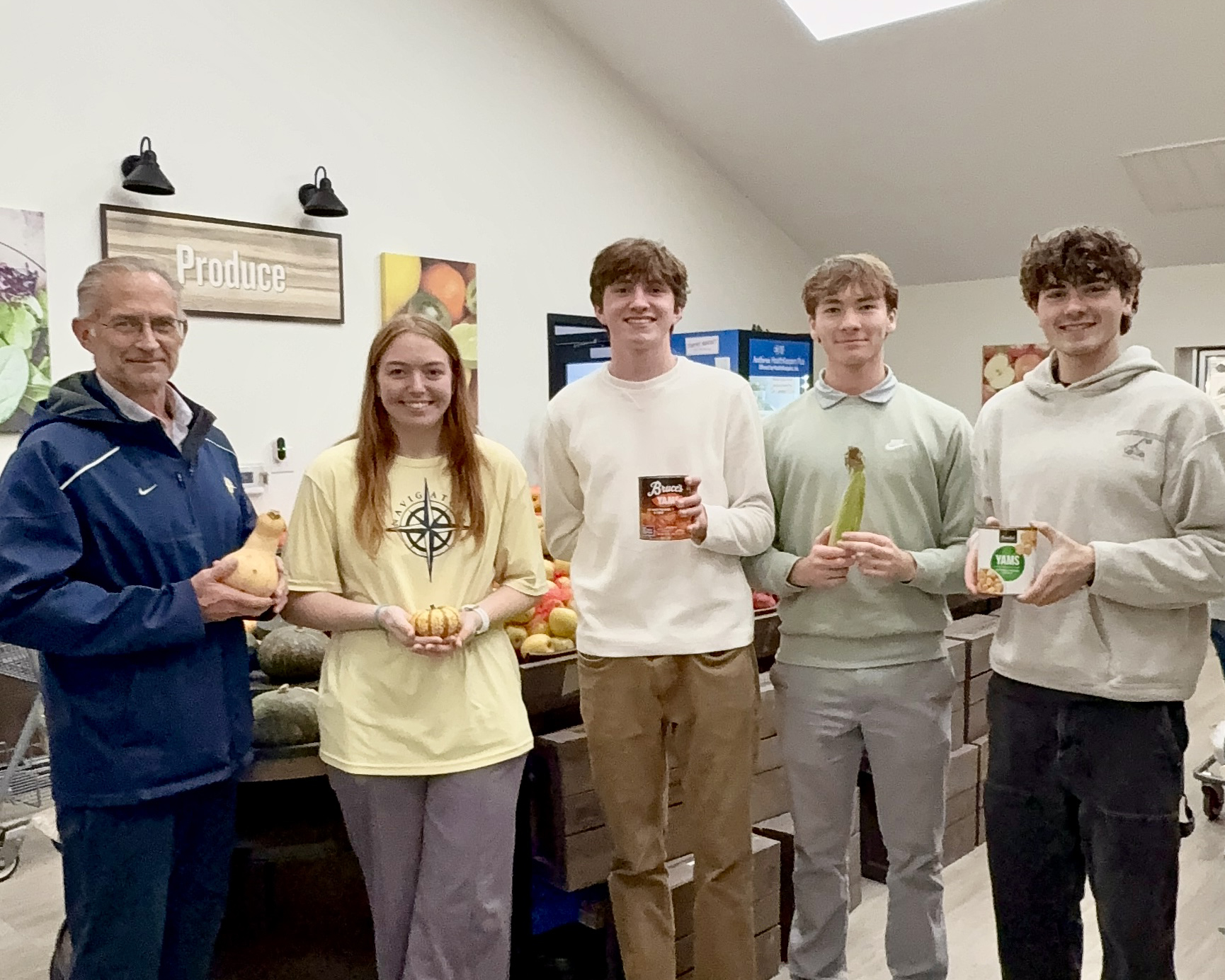 HRA Director of Alumni Relations Tommy Yevak '83 and Philanthropy Committee at THRIVE Peninsula food pantry