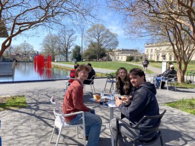 HRA seniors eating lunch outdoors at the VMFA