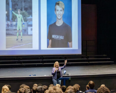 Highway safety advocate Tammy Guido McGee with photos of her son at HRA