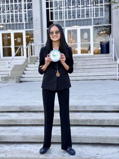 HRA eighth grader Bella Nguyen '30 with the Tidewater Science and Engineering Fair Grand Prize