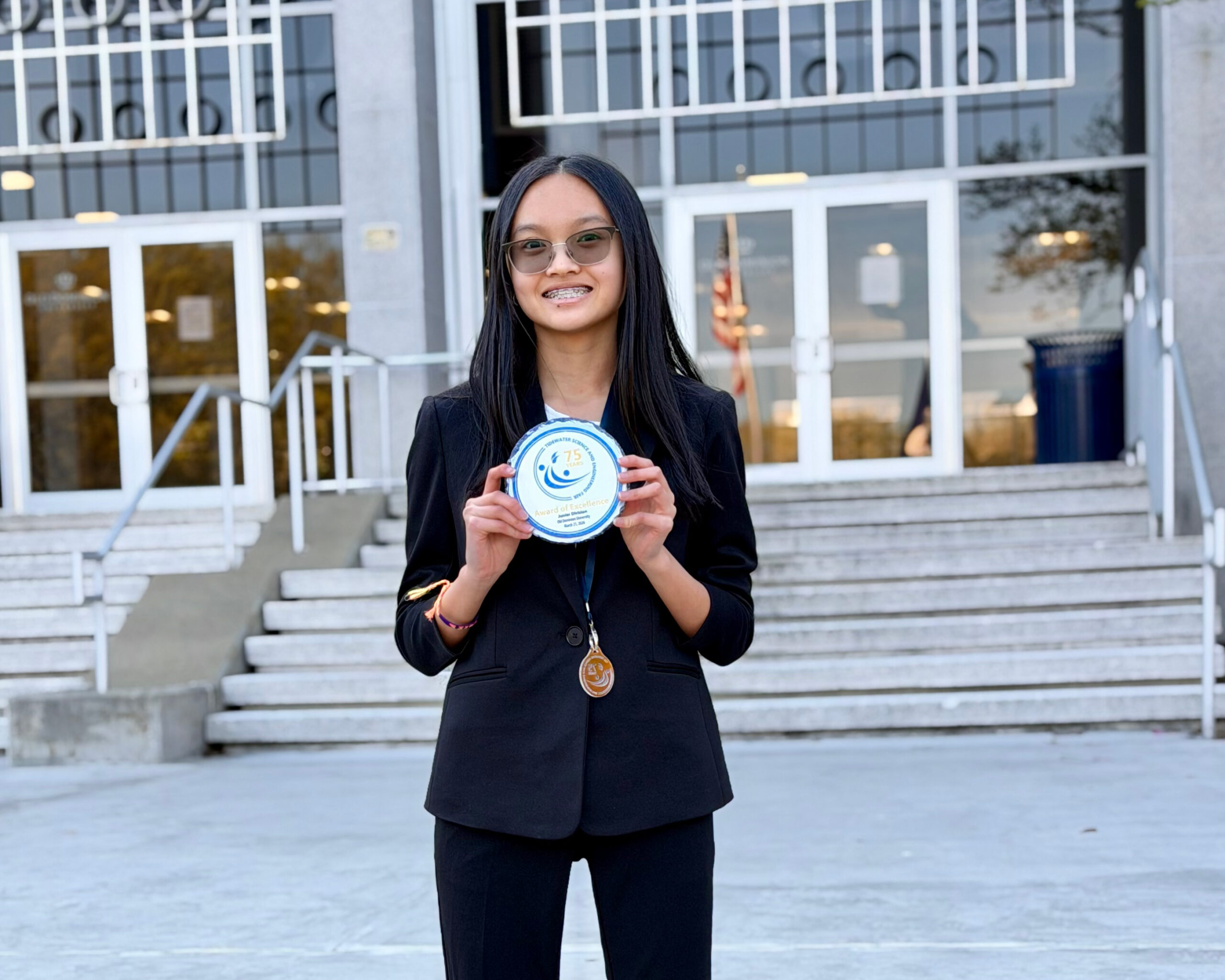 HRA eighth grader Bella Nguyen '30 with the Tidewater Science and Engineering Fair Grand Prize