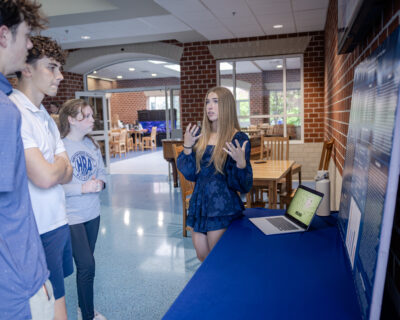Sophomore Alana Barnhart '28 presenting at the 2026 HRA Research Symposium