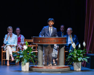 HRA eighth grader Arnesh Paul '30 speaking at the 2026 Crossing Ceremony