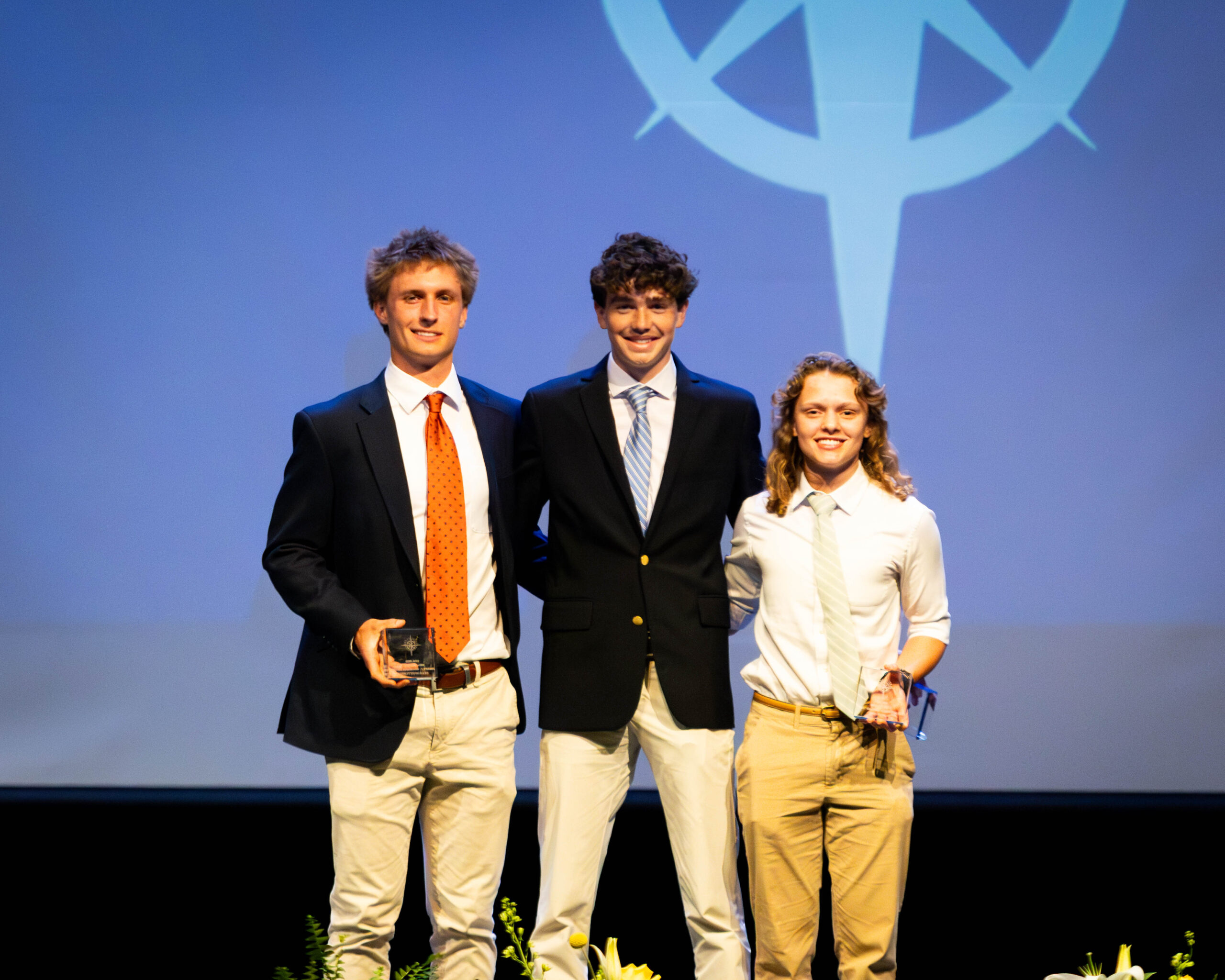 Junior Graham Hutchens ’27 and seniors Jamie Dornan ’26 and Josie Brindley ’26 at the 2026 HRA Navigator Night