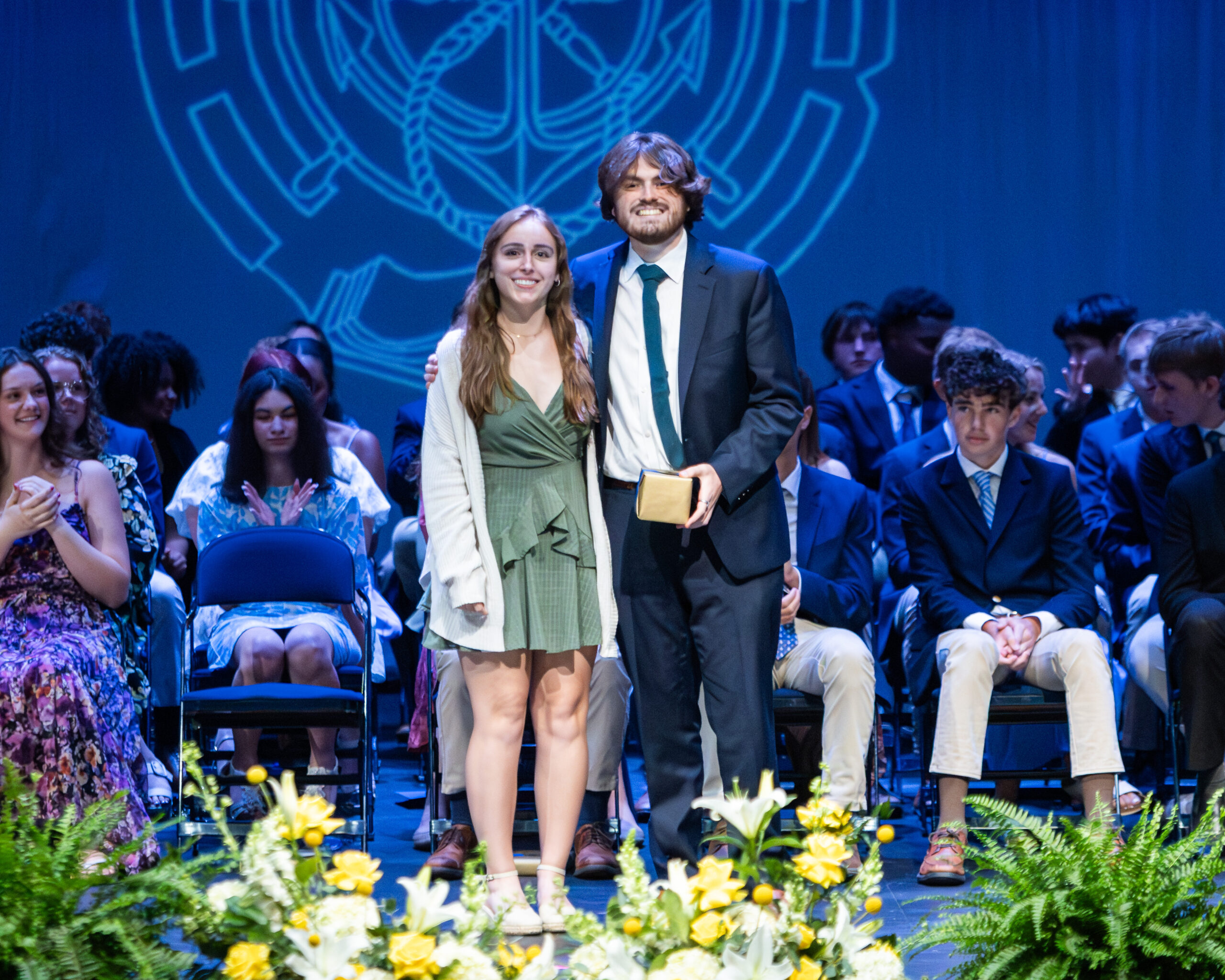 Senior Carys Casper '26 with recent alumnus Reece David '25 at the 2026 HRA Upper School Awards Assembly