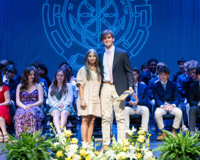 HRA Upper School science teacher Dr. Maribel Gendreau with senior Henry Stern '26 at the 2026 Upper School Awards Assembly
