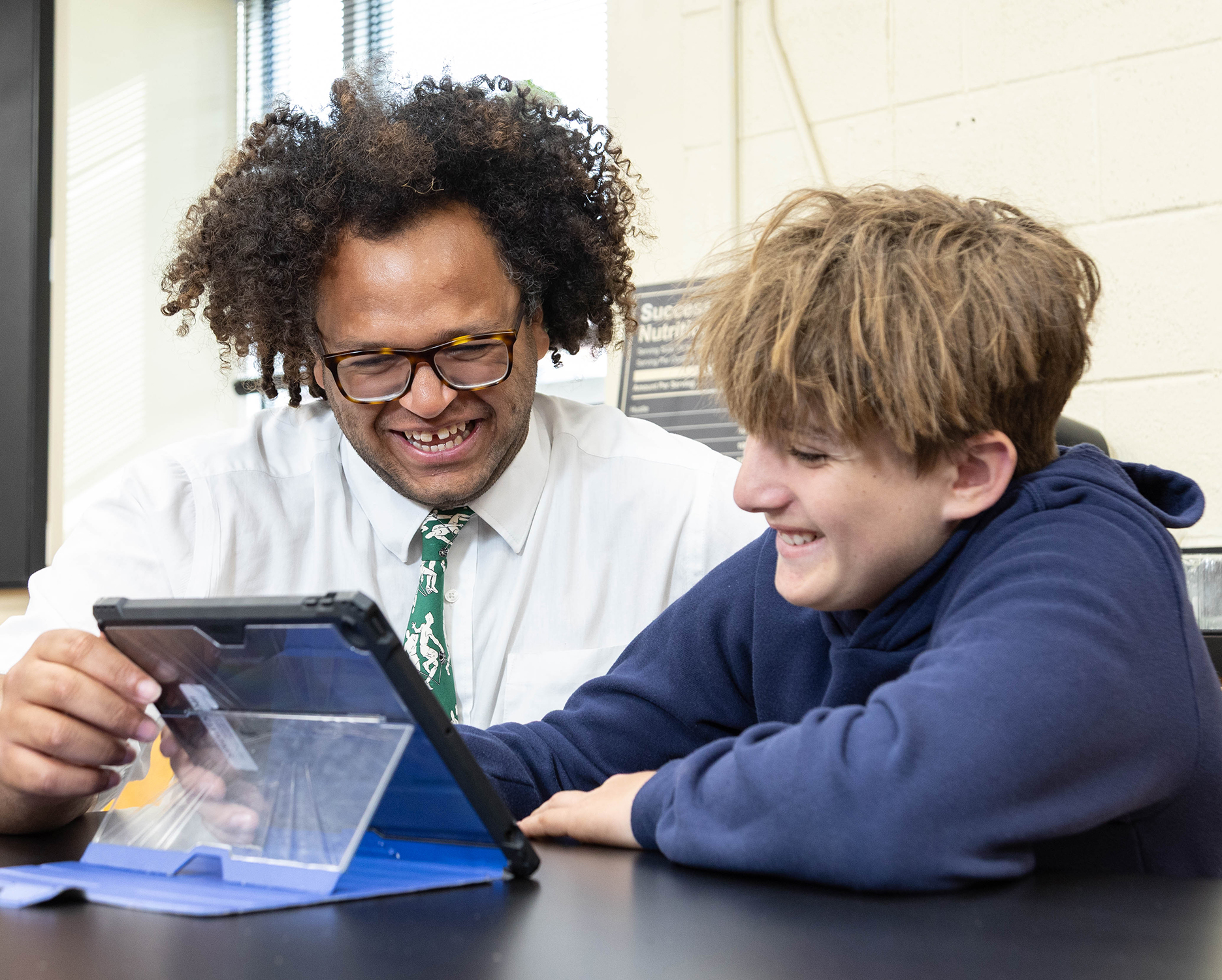 Minor and Student HRA Middle School science teacher Zach Minor with a student