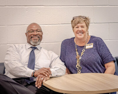 HRA Middle School student support specialist and varsity football head coach Rodney Taylor with Director of the Student Support Center Lisa Thatcher