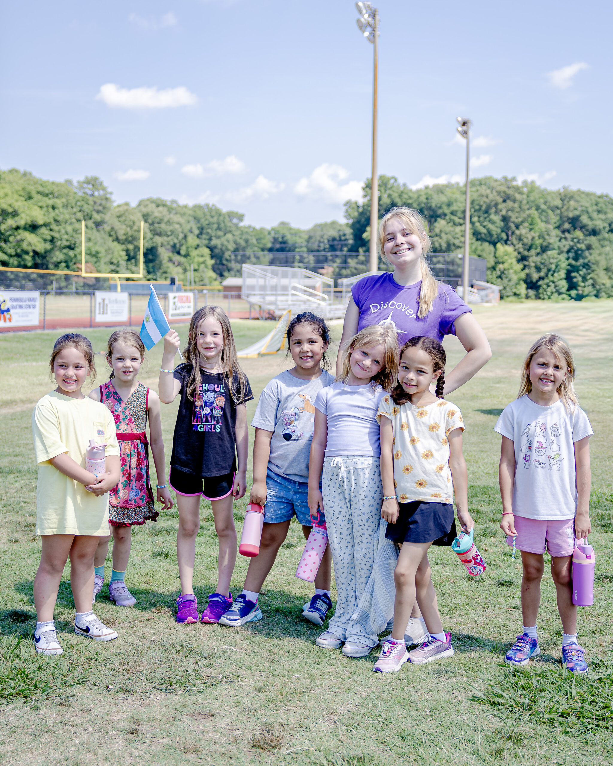 HRA campers and a staff member celebrating the World Cup during summer 2026