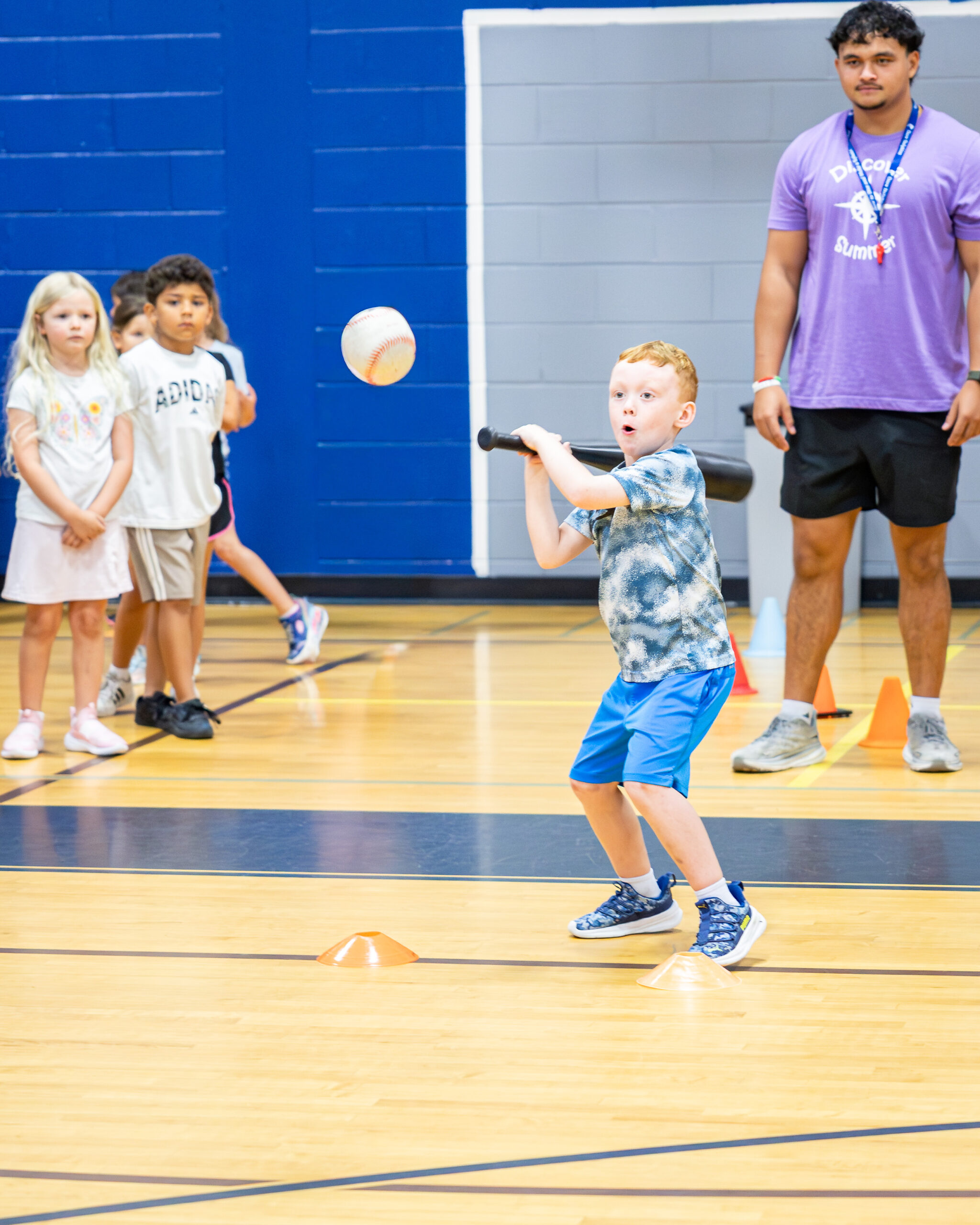 HRA campers playing indoor softball during summer 2026