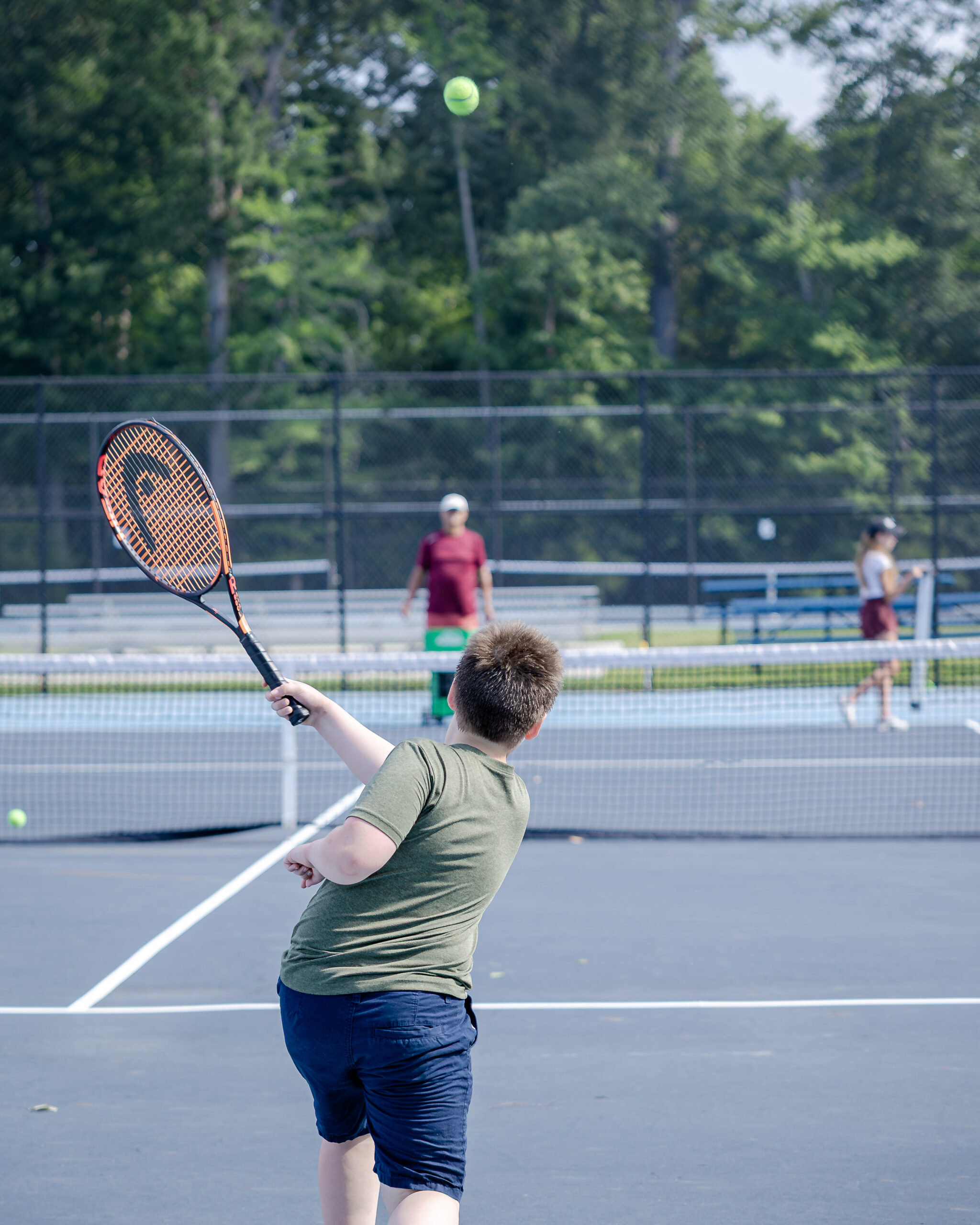 HRA campers playing tennis in summer 2026
