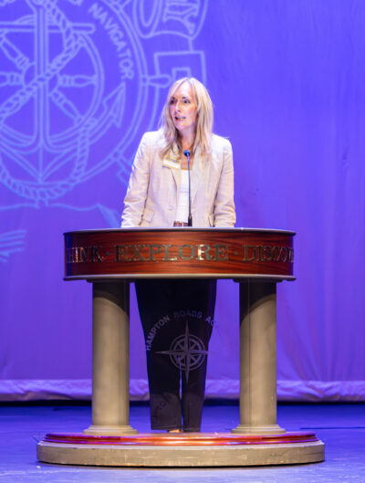 HRA Director of Middle School Abigail Whorley speaking at the 2026 Middle School Honor Assembly