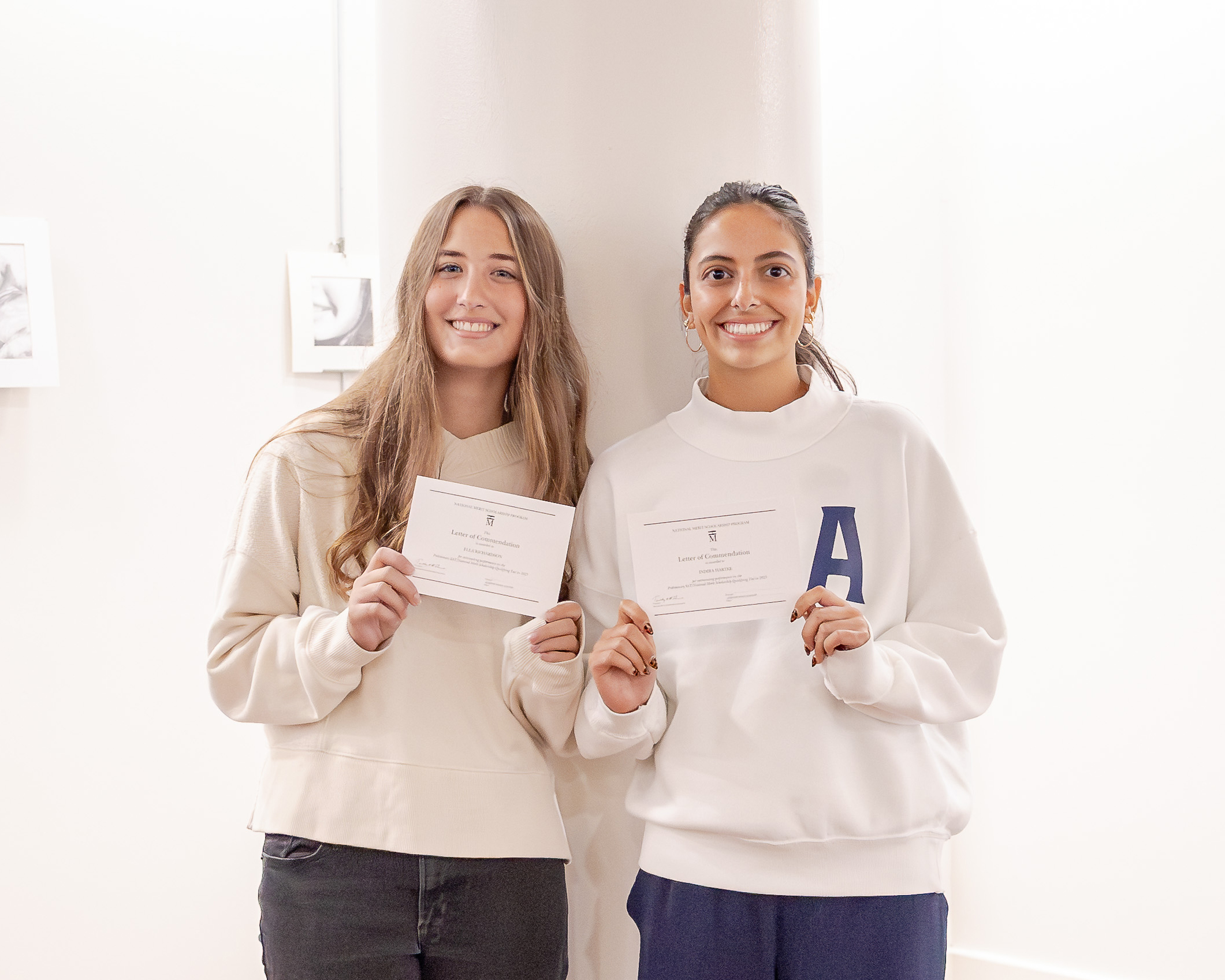 HRA seniors and National Merit Commended Students Ellie Richardson '27 and Indira Hartke '27