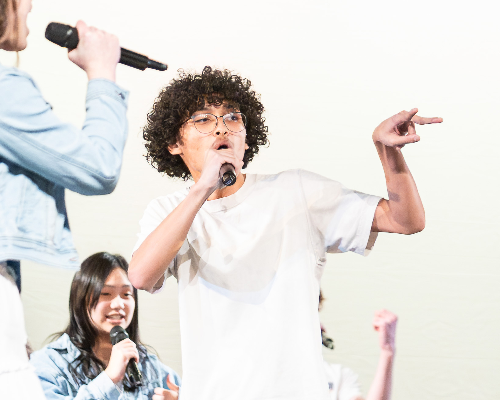 HRA senior Aaron Carlson '27 singing with the a cappella group Nowhere to Hide