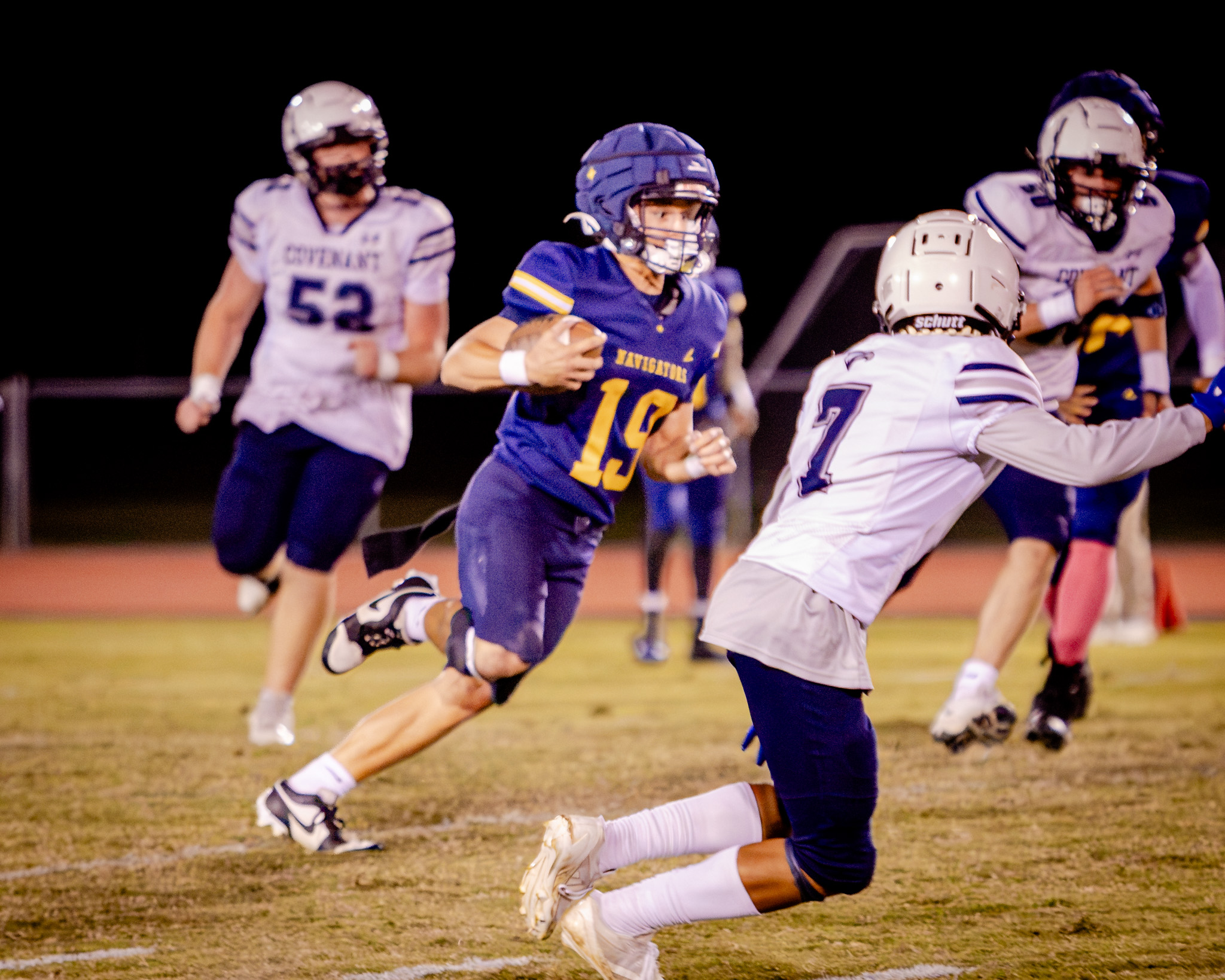 An HRA football player running with the ball during the 2026 Homecoming game