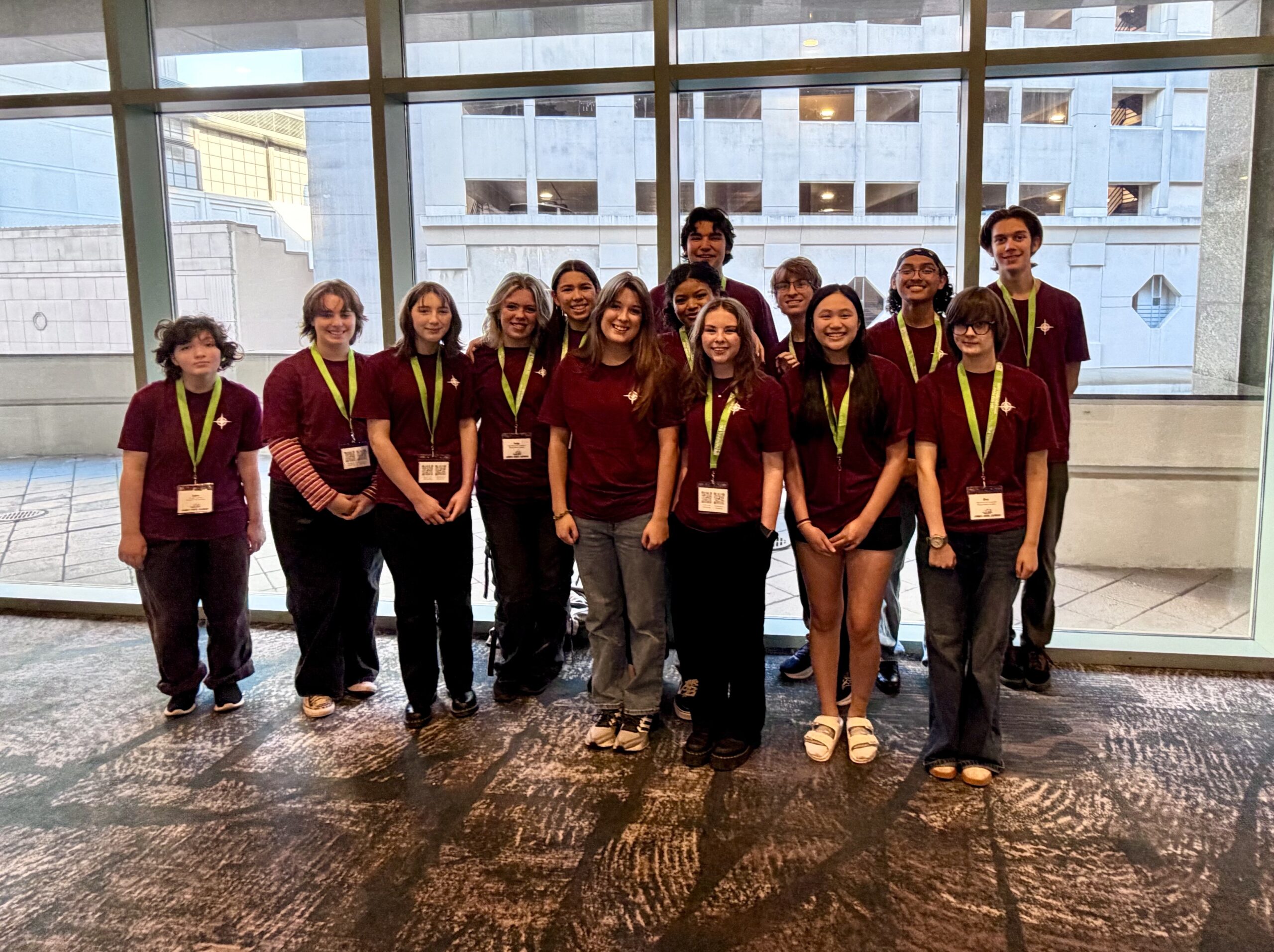 HRA alumna Hannah Mead '25 with current HRA theatre students at the 2026 Virginia Theatre Association conference