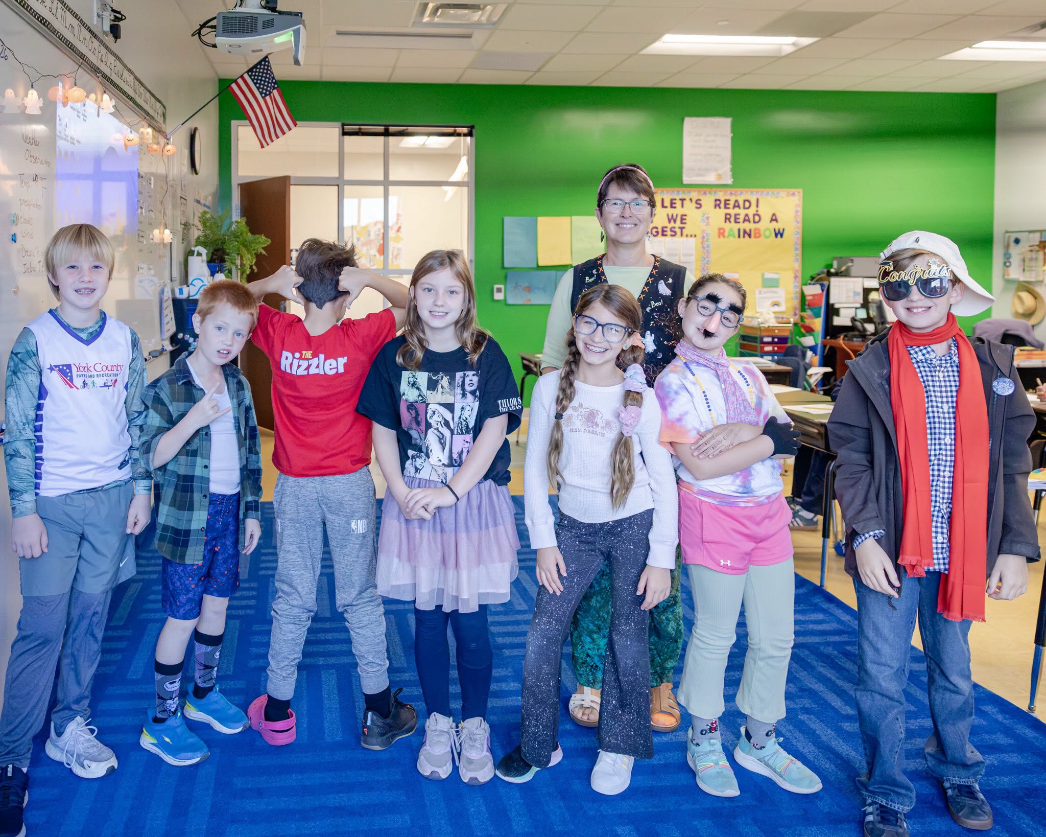 HRA fourth-grade teacher Jennifer Massengill and her students in strange outfits for Wacky Dress Day during Spirit Week