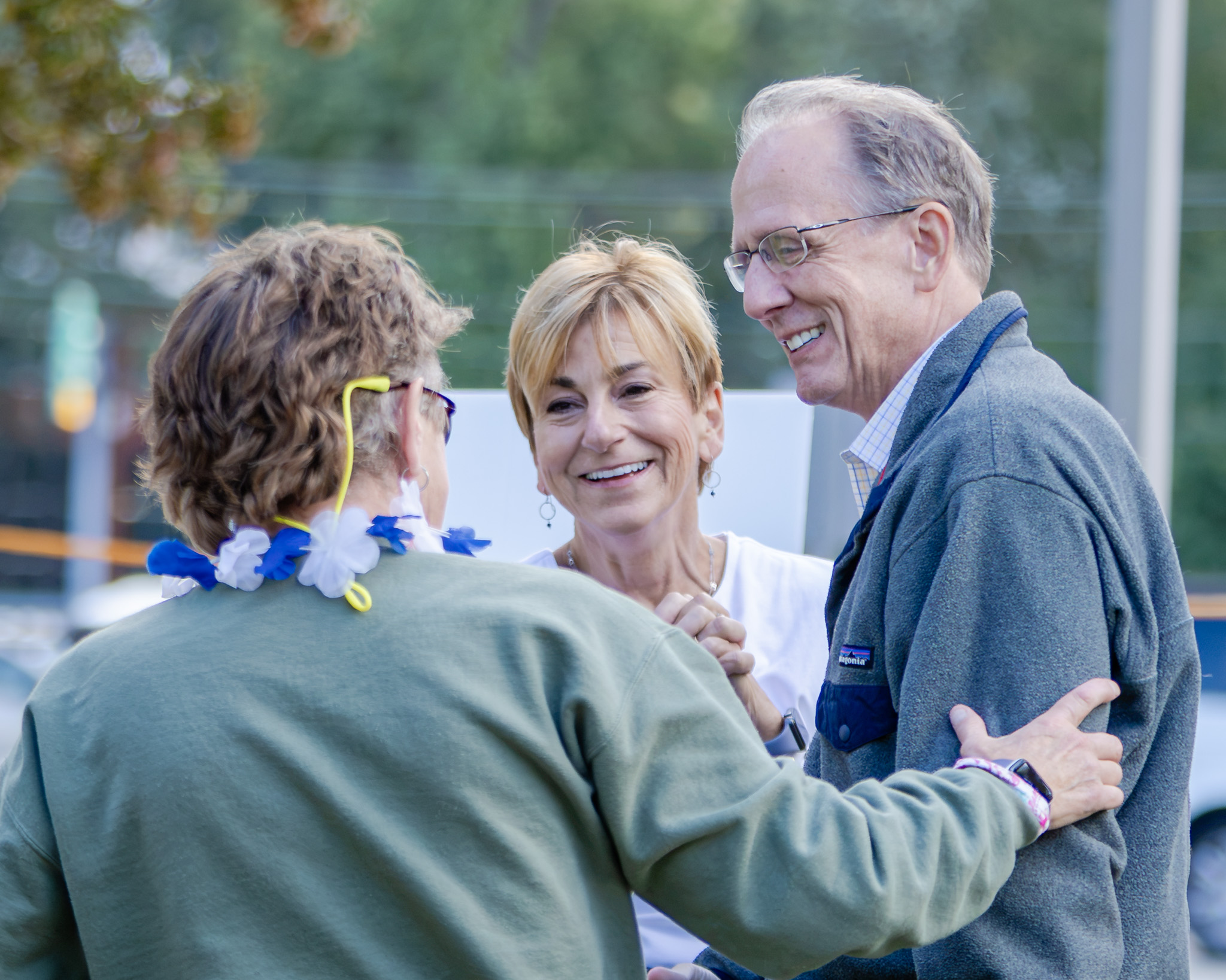 HRA alumni talking and smiling during the 2026 All-Alumni Tailgate
